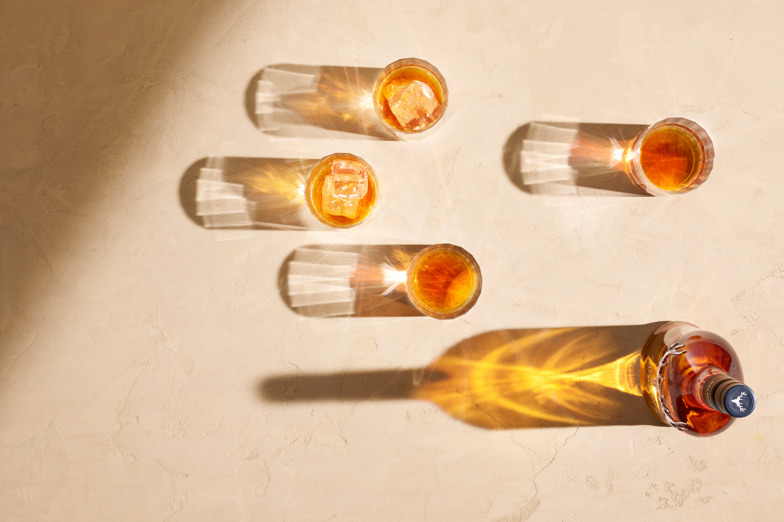 Bottle and glasses seen from above